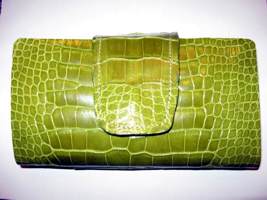 Genuine American Alligator skin is an exquisite, elegant, and durable material. Don't be fooled by imitations!